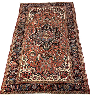 Persian Brown, Blue and Rose Heriz Rug with Green, Cream and Olive Accents by Miss Daisy's Consignment & Auction House