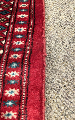 Pakistani Red and Burgundy Turkoman Rug with Blue and Cream Accents - Wool on Cotton Foundation