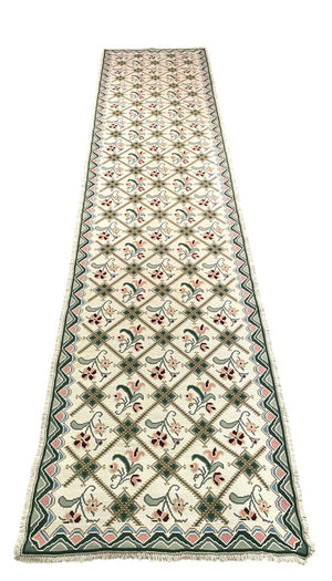 Portuguese Cream and Green Arraiolos Runner Rug with Dark Red and Pink Accents by Miss Daisy's Consignment & Auction House