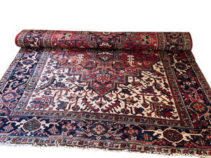 Persian Heriz Wool Rug 6'.5 x 9'.5 by Miss Daisy's Consignment & Auction House