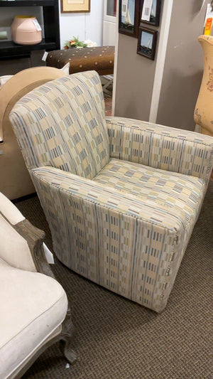Crate and Barrel swivel upholstered armchair