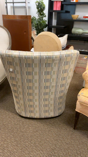 Crate and Barrel swivel upholstered armchair