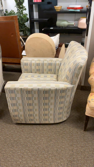 Crate and Barrel swivel upholstered armchair