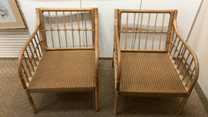 Pair of rattan arm chairs with cushions