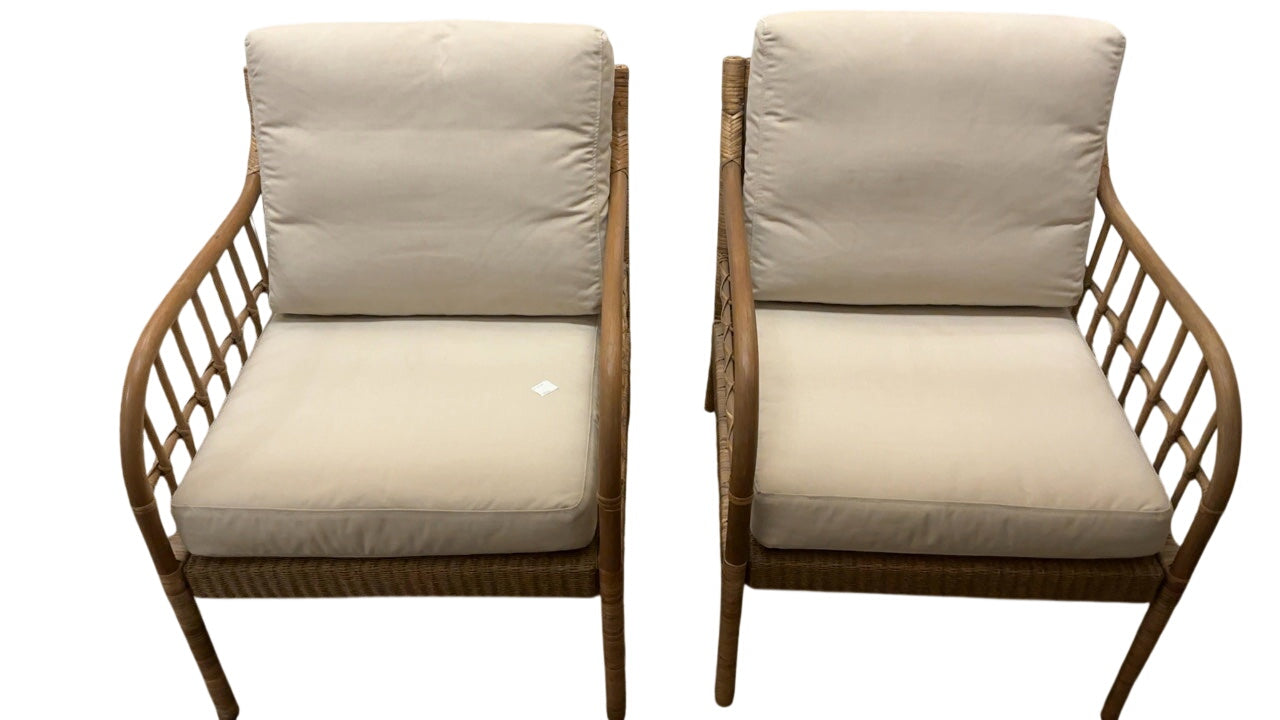 Pair of rattan arm chairs with cushions