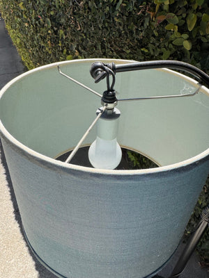 Black gooseneck floor lamp with blue shade