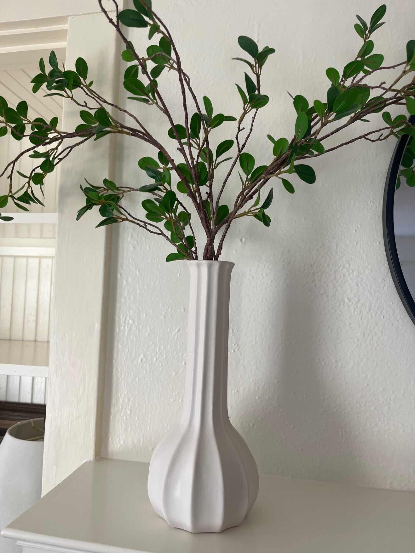 White Vase with Artificial Stems