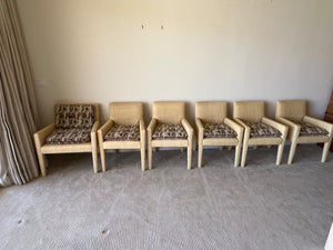 Six Rattan Woven chairs with Cushions by J. Robert Scott