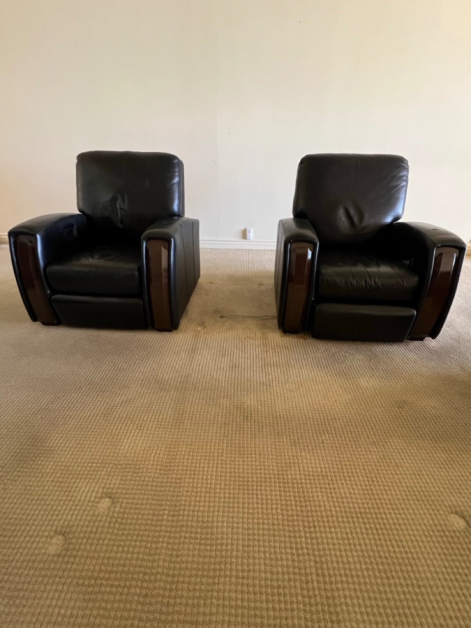 Two Black Leather Motorized Reclining Chairs With Wooden Accents