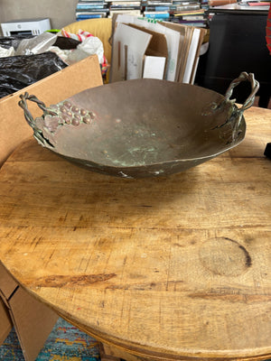 Round metal bowl with handles