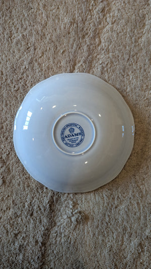 Set of 8 porcelain saucers 