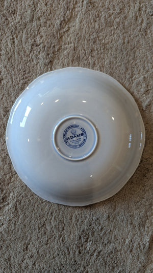 Set of 8 porcelain tea saucers