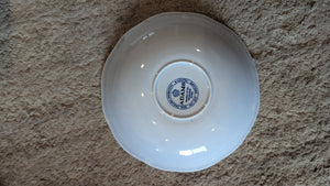 Set of 8 porcelain saucers