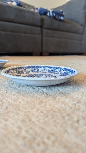 Set of 8 porcelain saucers 