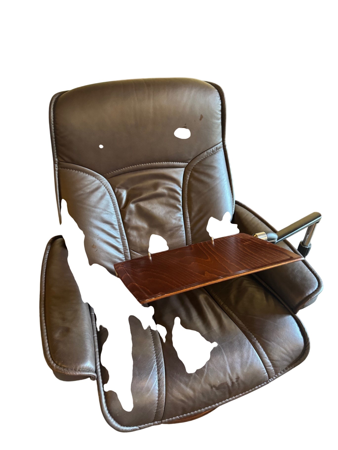 Ekornes Stressless recliner features a signature swivel base and a matching ottoman