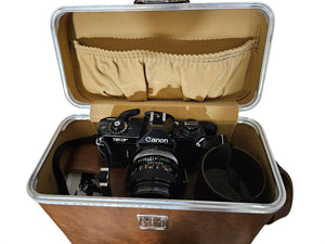 Canon EF 35mm SLR Camera Body Only with Built-In Lens Mount (5.7 in W x 3.8 in H x 1.9 in D)