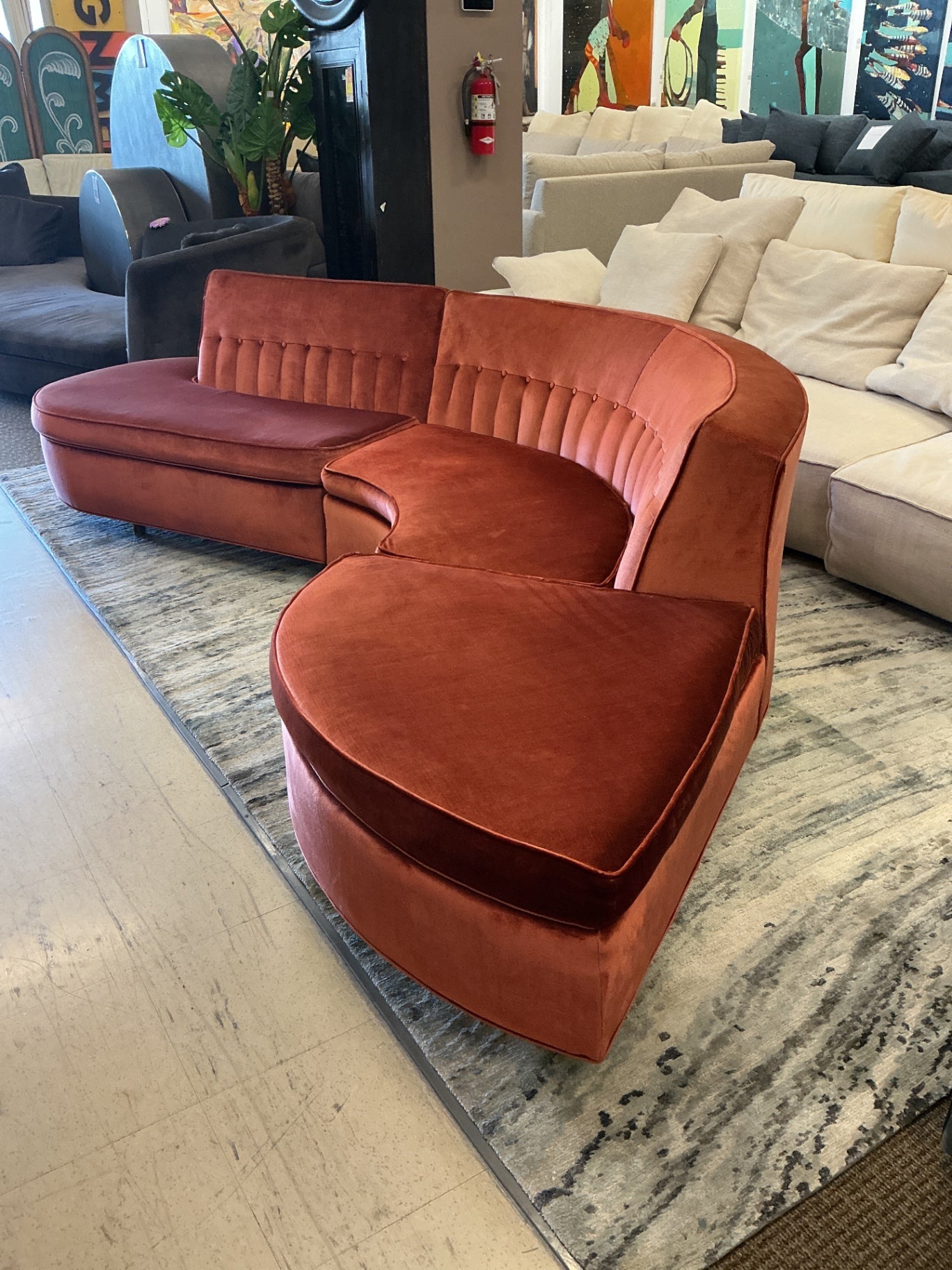 Postmodern / Vladimir Kagan-Inspired Serpentine Burnt Orange Sectional Sofa. 108" length x 25" Back Height x 15.5" front height x 25" cushion depth