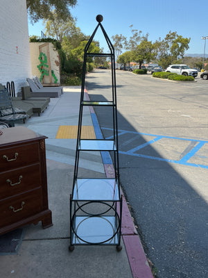 Iron Eterge with glass shelves measuring 70 tall by 16 x 16 wide