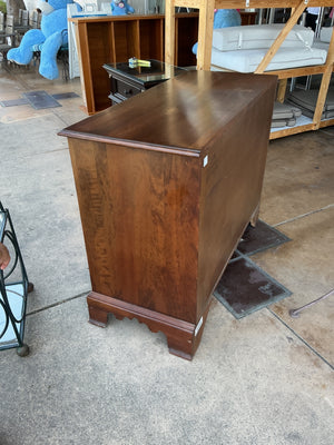 Four drawer dresser with gold hardware measuring 44, x 33 by 20