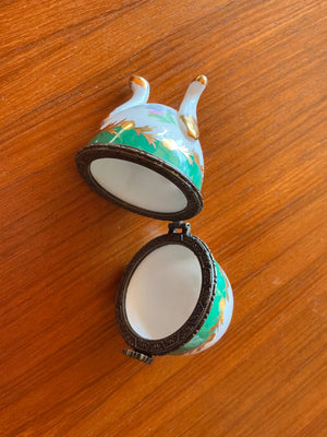 Decorative Egg-Shaped Trinket Box with Hinged Metal Band, Floral Decoration, Green & White Panels, Gilt Accents