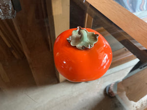 Persimmon glass figurine