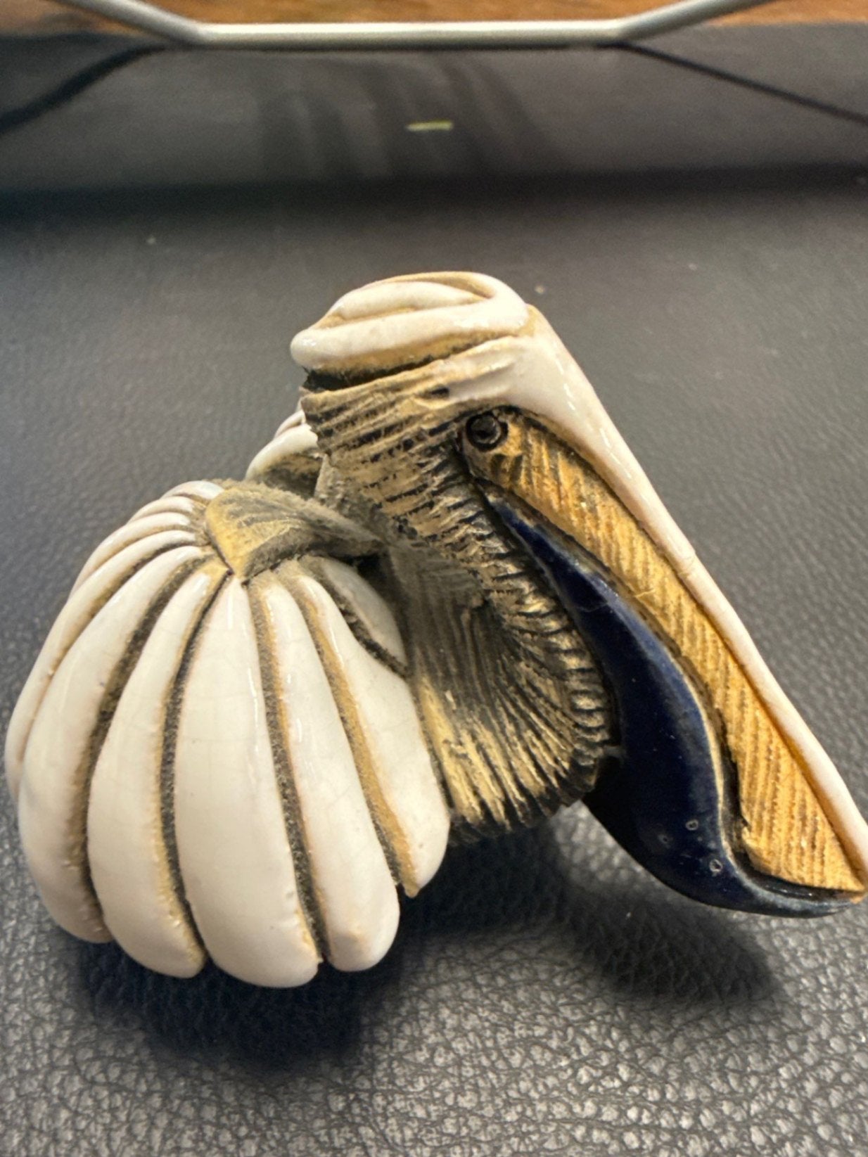 Small Signed Glazed Ceramic Pelican Figurine with Blue Accent (3 in)