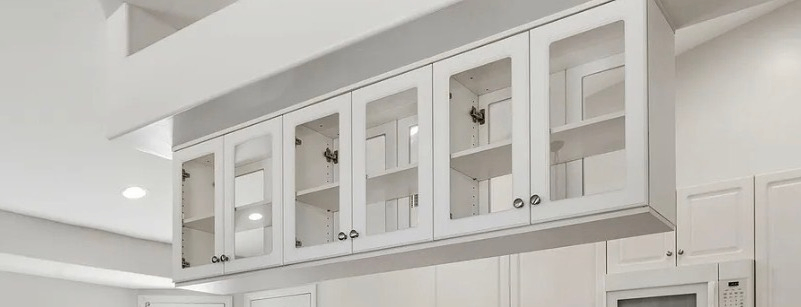 3 White Wall-Mounted Kitchen Cupboards with Glass Doors