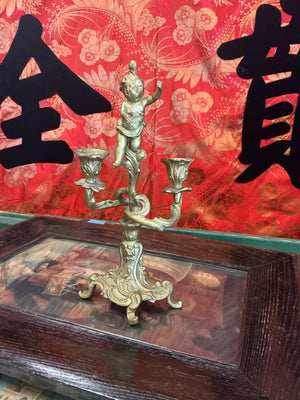 Ornate Candelabra with a Cherub Figure
