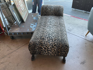 Antique shades lounge with leopard print upholstery on Mahogany base with feet measuring 78 x 33 x 18