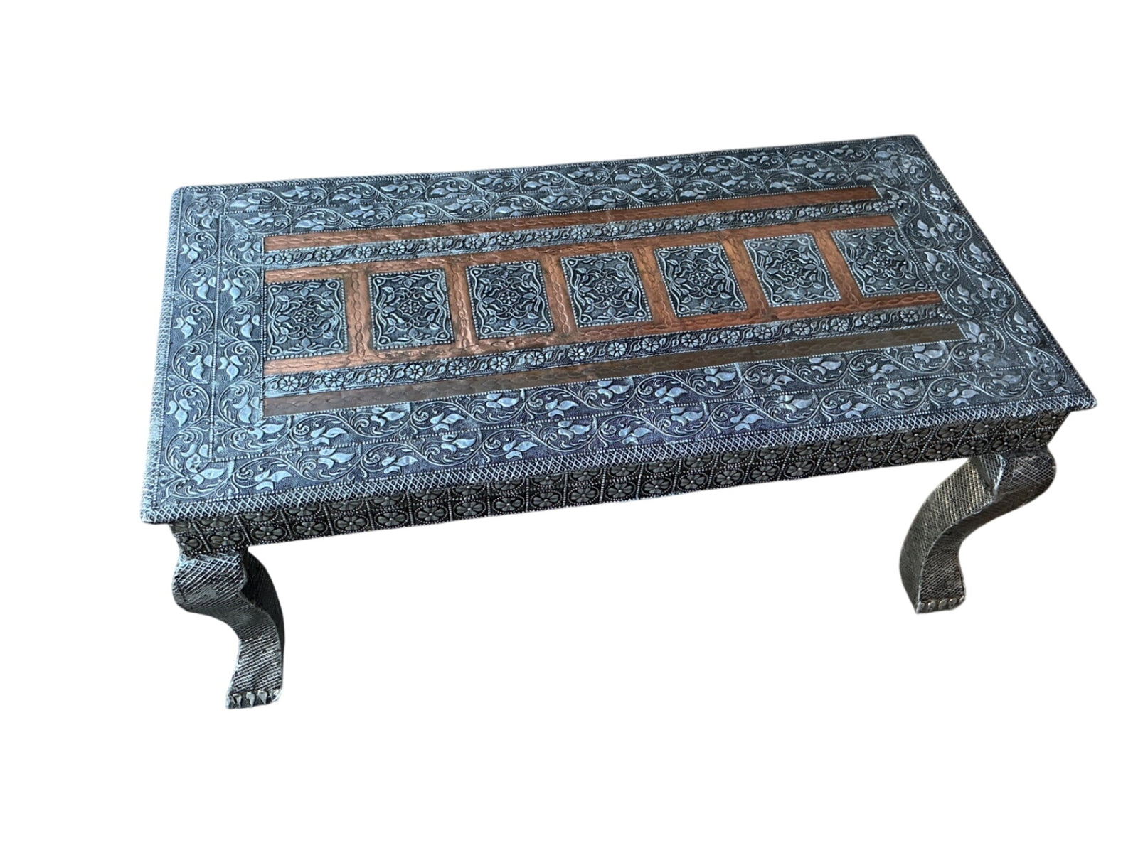 This is a reposSe coffee table measuring 36 inches wide by 18 inches deep and 17 inches tall made with copper and tin
