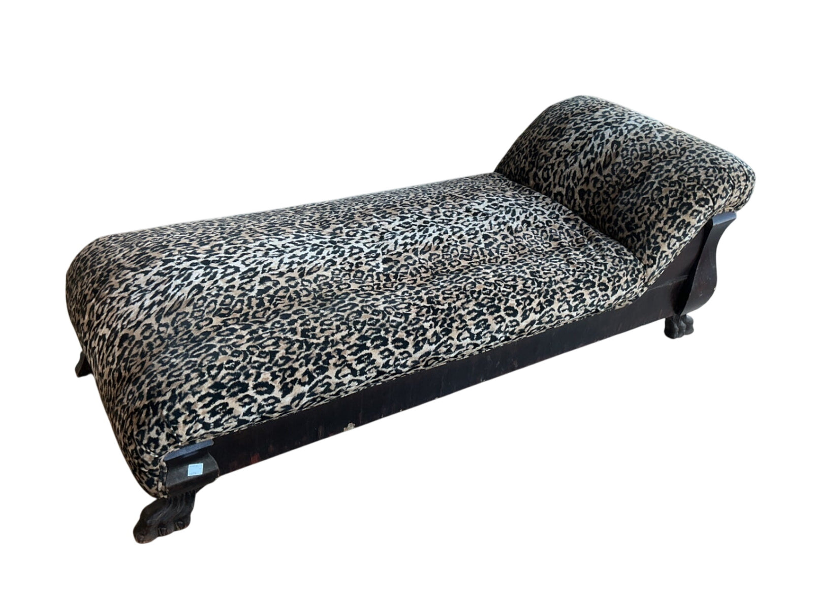 Antique shades lounge with leopard print upholstery on Mahogany base with feet measuring 78 x 33 x 18