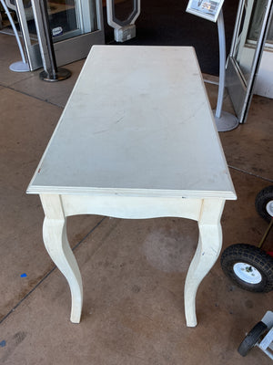 This is a white writing desk measuring 46 inches wide 30 inches tall 22 inches deep