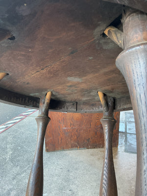 Unique, custom antique table great for a cigar lounge, baseball bat legs, approximately measuring 30 inches 24 inches tall