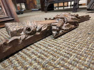 French Carved Walnut Wood Pediment 18th Century (Louis XVI Crest featuring a central ribbon bow, a quiver of arrows or torch, floral rosettes) 27" x 9" (Middle is broken off)