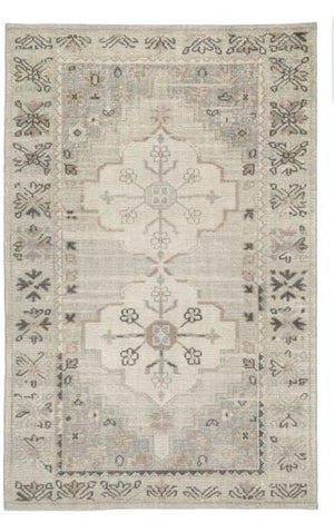 pottery barn 100% wool rug 5x8