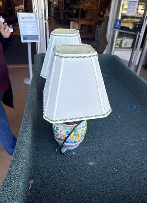 Pair of Italian Majolica Pottery Boudoir Lamps with Floral Motifs and Off-White Fabric Shades