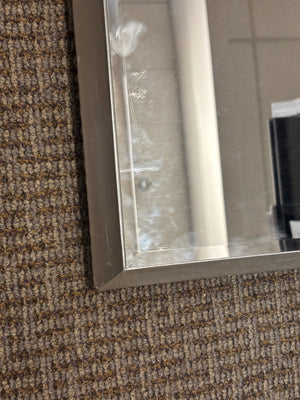 * Contemporary Silver-Framed Beveled Wall Mirror Height: Approximately 48” * Width: Approximately 11”