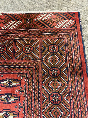 Hand Knotted Red Persian Rug, with light brown/beige accents.