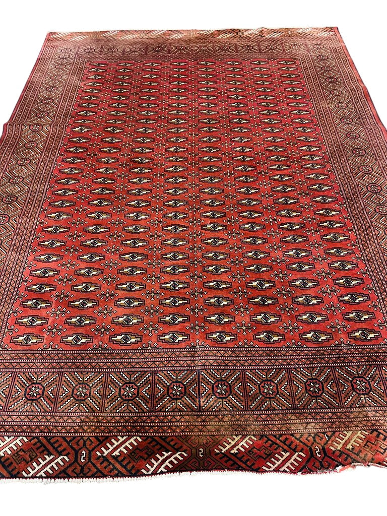 Hand Knotted Red Persian Rug, with light brown/beige accents. by Miss Daisy's Consignment & Auction House