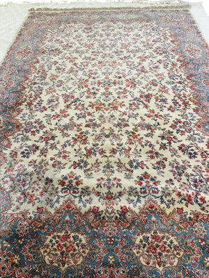 Karastan Kirman Wool Rug 8'.8" x 12' by Miss Daisy's Consignment & Auction House