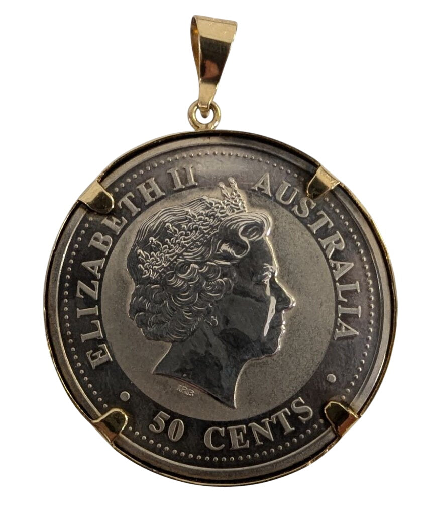 Australia 999 Silver 50cent Coin Gold Bezel by Miss Daisy's Consignment & Auction House