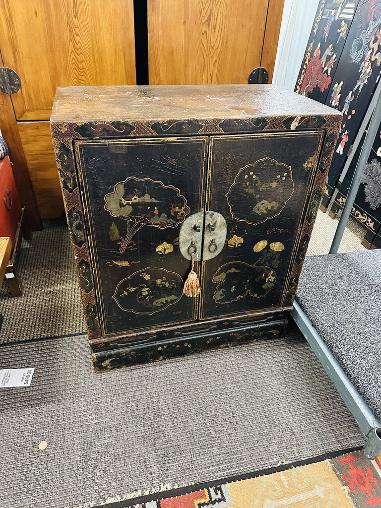 3rd quarter 19th century, vernacular style, black lacquered and hand painted, double door cabinet from Japan.