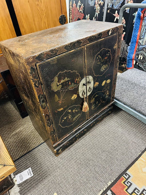 3rd quarter 19th century, vernacular style, black lacquered and hand painted, double door cabinet from Japan.