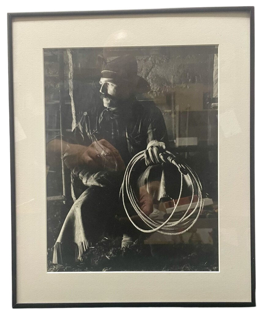 Black and White Photo Cowboy with His Rope by Miss Daisy's Consignment & Auction House