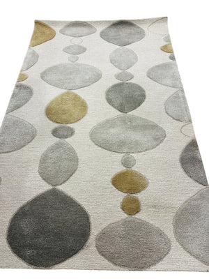 Jaipur Wool Hand Tufted Rug 5 x 8 by Miss Daisy's Consignment & Auction House