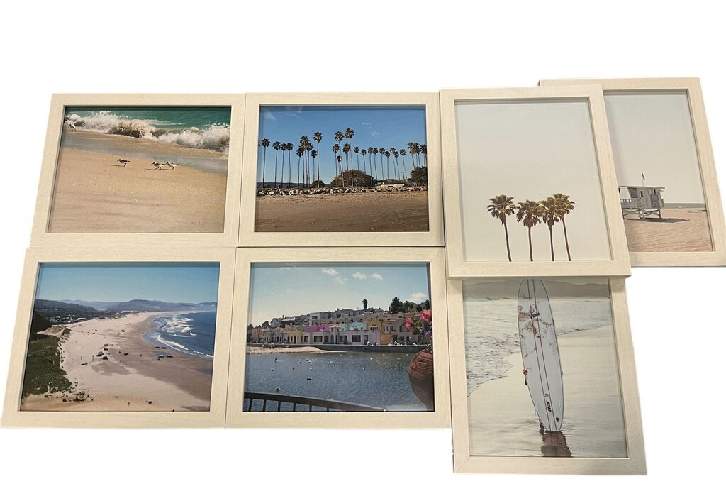 Various Beach Themed White Framed Color Photograph