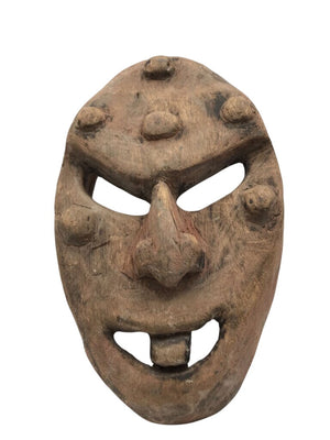 Carved Wooden Tribal Wall Mask by Miss Daisy's Consignment & Auction House