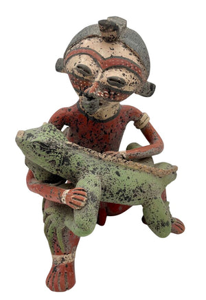 Replica Pre- Columbian Nayarit Mexican Terracotta Seated Warrior with Lizard by Miss Daisy's Consignment & Auction House