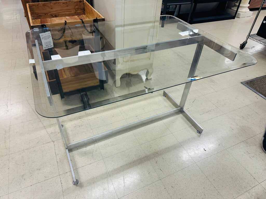 Mid Century Chrome Base Glass Top Console Table 46x36x30 by Miss Daisy's Consignment & Auction House