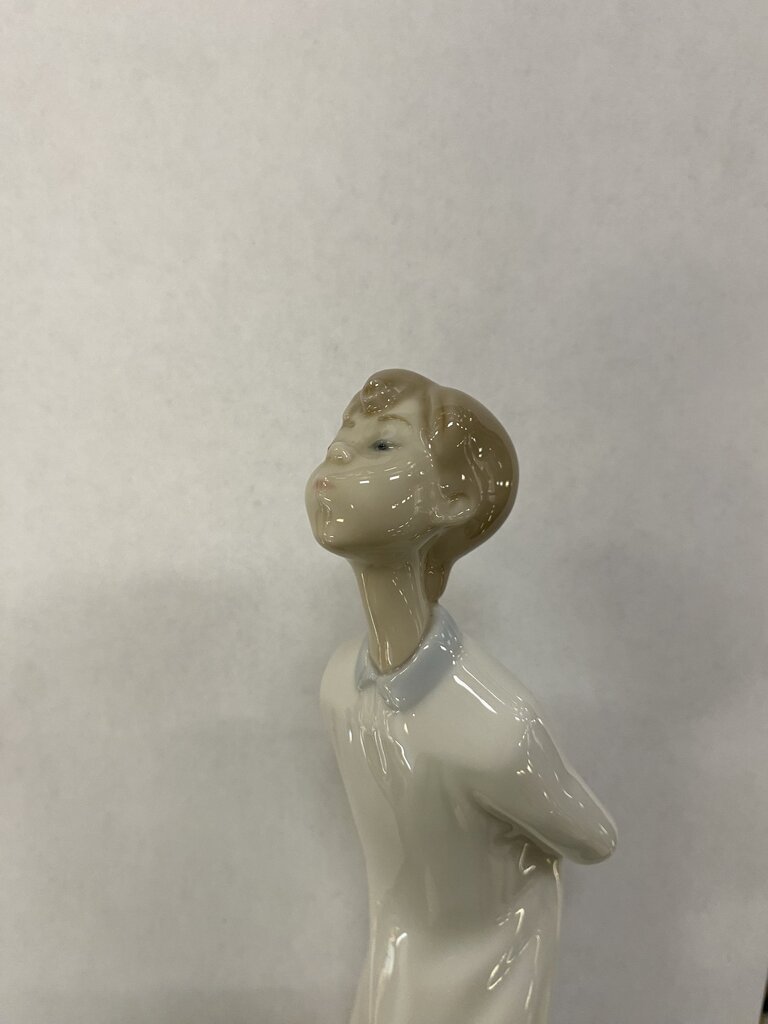 Lladro "Boy Blowing Kiss" Porcelain Figure